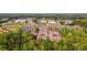 Aerial view of community amenities, including tennis courts, a pond, and athletic fields at 660 Gran Heritage Way, Dacula, GA 30019