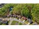 Beautiful aerial view of neighborhood showcasing well-maintained homes and tree-lined streets at 660 Gran Heritage Way, Dacula, GA 30019