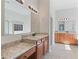 Bathroom with double vanity and granite countertops at 660 Gran Heritage Way, Dacula, GA 30019
