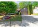 Inviting single-story home with brick facade, manicured lawn, and blue shuttered windows at 660 Gran Heritage Way, Dacula, GA 30019