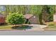 Charming single-Gathering home featuring a well-manicured front yard and inviting curb appeal in a lush, wooded neighborhood at 660 Gran Heritage Way, Dacula, GA 30019