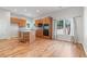 Bright kitchen featuring an island, wooden cabinets, tile backsplash, and modern appliances at 660 Gran Heritage Way, Dacula, GA 30019