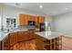Bright kitchen with an island, granite countertops, and modern appliances at 660 Gran Heritage Way, Dacula, GA 30019