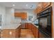 Spacious kitchen with stainless steel appliances and granite countertops at 660 Gran Heritage Way, Dacula, GA 30019