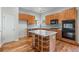 Kitchen featuring wooden cabinets, an island, and stainless steel appliances at 660 Gran Heritage Way, Dacula, GA 30019