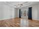 Spacious bedroom with tray ceilings, a ceiling fan, and natural light at 660 Gran Heritage Way, Dacula, GA 30019