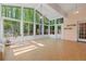 Sunroom with many windows offering great outdoor views at 660 Gran Heritage Way, Dacula, GA 30019