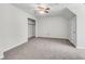 Bedroom featuring neutral walls, plush carpet and a walk-in closet at 9055 Carroll Manor Dr, Sandy Springs, GA 30350