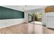 Dining area with new floors, a large sliding glass door leading to the outdoor deck at 9055 Carroll Manor Dr, Sandy Springs, GA 30350