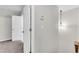 Hallway featuring plush carpeting and a modern light fixture at 9055 Carroll Manor Dr, Sandy Springs, GA 30350