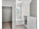 Bright hallway featuring a window seat and storage at 9055 Carroll Manor Dr, Sandy Springs, GA 30350