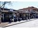 Charming restaurants offer outdoor seating on a sunny day, creating an inviting atmosphere at 9055 Carroll Manor Dr, Sandy Springs, GA 30350