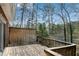 Relax on this private wooden deck with a serene wooded view at 9055 Carroll Manor Dr, Sandy Springs, GA 30350
