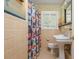 Bathroom showcasing a retro color scheme and classic fixtures, offering a clean and functional space at 1850 Winchester Trl, Brookhaven, GA 30341