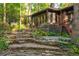 Home exterior and stone staircase with custom landscaping at 1850 Winchester Trl, Brookhaven, GA 30341