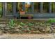 Beautiful landscaping stone garden bed with a rock wall and lush greenery surrounding the house at 1850 Winchester Trl, Brookhaven, GA 30341