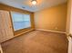Neutral bedroom with a large window providing plenty of natural light at 445 Pintail Ct, Suwanee, GA 30024