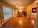 Kitchen with hardwood floors, stainless steel appliances, kitchen island and lots of light at 445 Pintail Ct, Suwanee, GA 30024