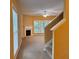 Open-concept living area featuring a fireplace and ample natural light at 445 Pintail Ct, Suwanee, GA 30024