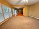 Open living area with hardwood floors, lots of natural light and view to kitchen at 445 Pintail Ct, Suwanee, GA 30024