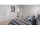 Bedroom features neutral colors, large closet, and comfortable bed at 627 Skytop Dr, Cumming, GA 30040