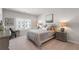 Bedroom boasts natural light, complemented by neutral tones at 627 Skytop Dr, Cumming, GA 30040
