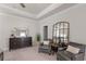 Spacious bedroom with sitting area has great natural light and room to relax at 627 Skytop Dr, Cumming, GA 30040