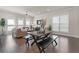 Open-concept living space featuring a spacious living room, dining area at 627 Skytop Dr, Cumming, GA 30040