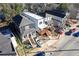 Aerial view of neighborhood houses with well-maintained exteriors, porches and landscaped yards at 906 Mcdaniel St, Atlanta, GA 30310