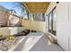 This backyard patio features a concrete floor, new wooden fence and modern wall finishes at 906 Mcdaniel St, Atlanta, GA 30310