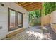 Cozy backyard patio with a wooden fence and access from the bedroom at 906 Mcdaniel St, Atlanta, GA 30310