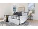Comfortable bedroom with large bed, stylish rug, and decor with plenty of natural light at 906 Mcdaniel St, Atlanta, GA 30310