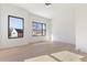 Bright bedroom with large windows offers ample natural light and views of the neighborhood at 906 Mcdaniel St, Atlanta, GA 30310