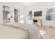 Bright bedroom with french doors, sleek desk, and minimalist decor offering a serene retreat at 906 Mcdaniel St, Atlanta, GA 30310