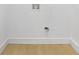 Empty room features laminate flooring and white walls at 906 Mcdaniel St, Atlanta, GA 30310