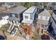 Stunning modern two-story home with striking curb appeal, charming front porch, and beautifully landscaped yard at 906 Mcdaniel St, Atlanta, GA 30310