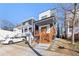 Modern home with a covered front porch, wooden stairs, and well-maintained lawn at 906 Mcdaniel St, Atlanta, GA 30310