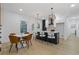 Modern kitchen features an island with seating, pendant lights, and stainless steel appliances at 906 Mcdaniel St, Atlanta, GA 30310