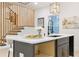 Close-up of kitchen island featuring quartz countertops, modern fixtures, and stylish barstools at 906 Mcdaniel St, Atlanta, GA 30310