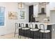 Contemporary kitchen boasting sleek design, quartz countertops, and bar stool seating at 906 Mcdaniel St, Atlanta, GA 30310