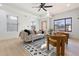 Open living space with neutral tones, stylish rug, and ample natural light through large windows at 906 Mcdaniel St, Atlanta, GA 30310