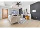 Cozy living room featuring a modern fireplace, sleek accent wall, and inviting decor at 906 Mcdaniel St, Atlanta, GA 30310