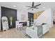 Bright living room with fireplace, modern furniture, and beautiful wood floors at 906 Mcdaniel St, Atlanta, GA 30310