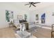 Serene main bedroom featuring hardwood floors, a modern ceiling fan, and French doors to the outside at 906 Mcdaniel St, Atlanta, GA 30310