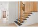 Modern staircase with wood and black accents creates a stylish transition between floors at 906 Mcdaniel St, Atlanta, GA 30310