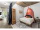 Stylized bedroom featuring modern bohemian decor, partitions and a plush rug at 245 N Highland Ne Ave # 220, Atlanta, GA 30307