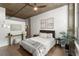 Stylish bedroom with a ceiling fan, modern decor, and ample natural light at 245 N Highland Ne Ave # 220, Atlanta, GA 30307