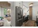 Gourmet kitchen featuring stainless steel appliances, sleek countertops, and ample storage space at 245 N Highland Ne Ave # 220, Atlanta, GA 30307