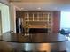 Modern kitchenette featuring stainless steel countertops, appliances, and sleek storage solutions at 245 N Highland Ne Ave # 220, Atlanta, GA 30307