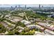 Panoramic aerial view of the neighborhood, showcasing the skyline, lush greenery, and residential buildings at 245 N N Highland Ne Ave # 220, Atlanta, GA 30307